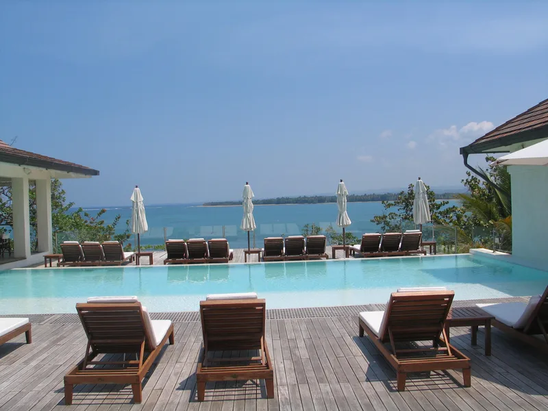 Rooftop infinity pool overlooking the ocean at Casa Colonial Beach & Spa