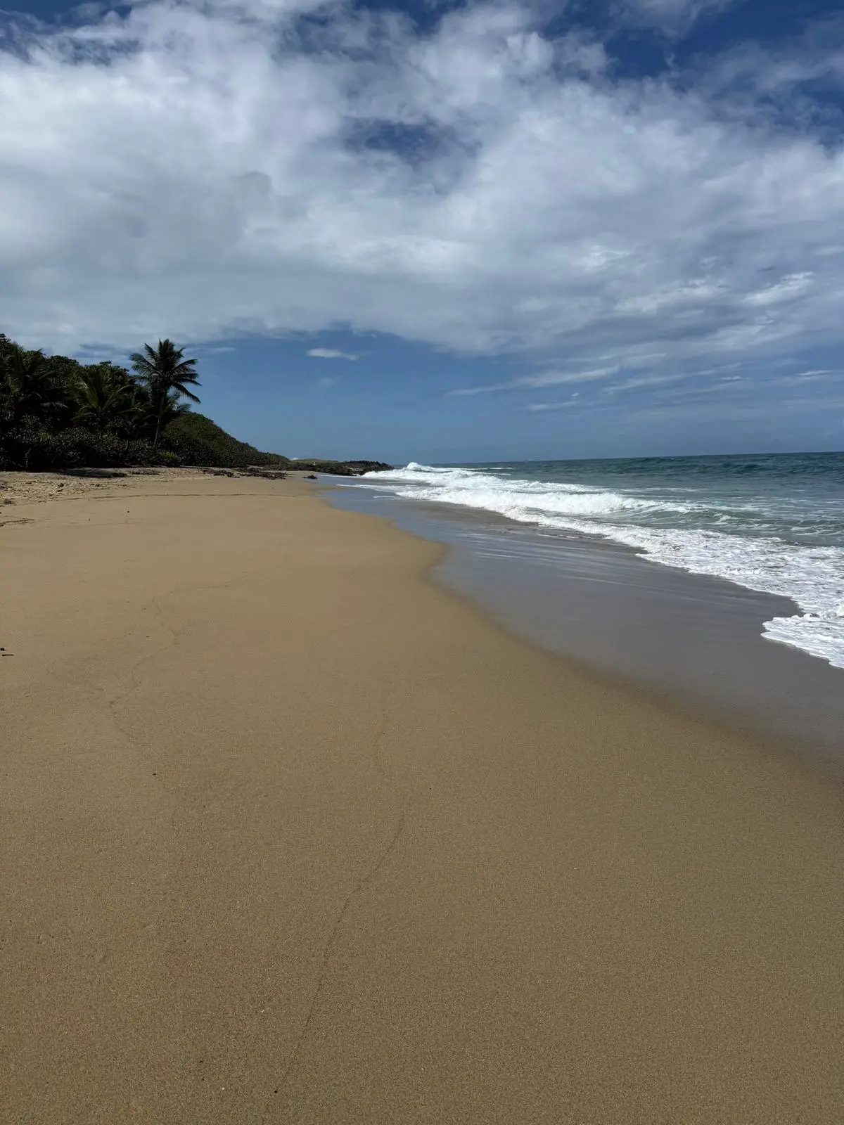 Empty Perla Marina beach with Atlantic waves