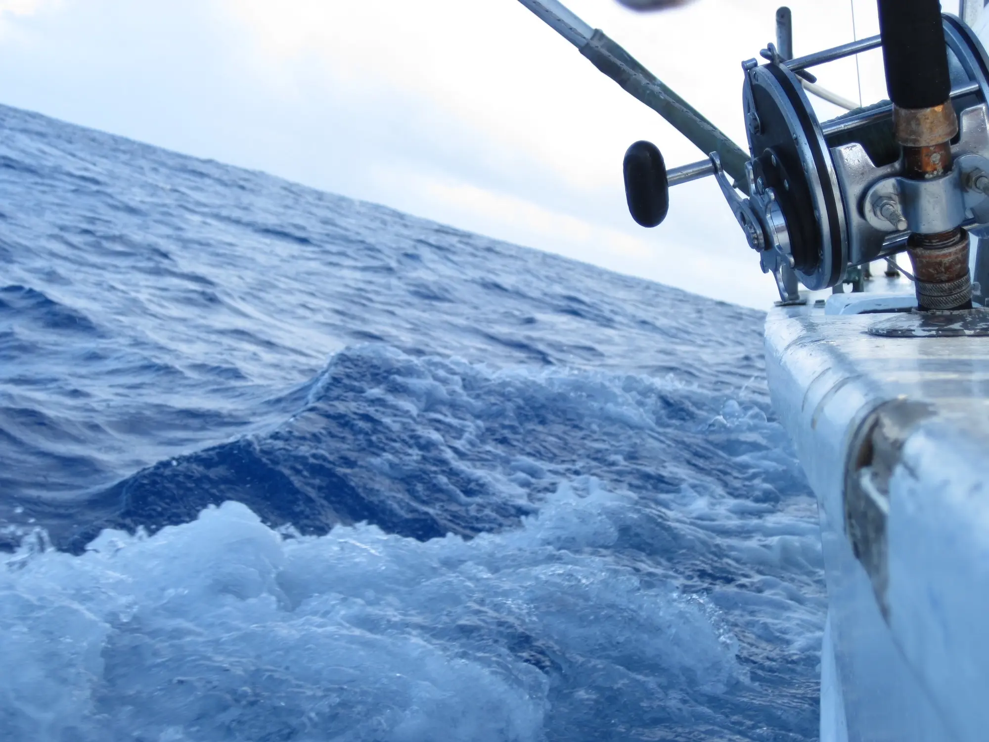 Deep sea fishing rod and reel out on the open Atlantic off the Dominican Republic north coast